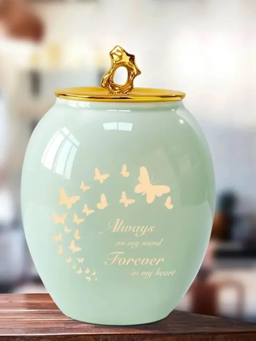 Decorative Mint Green Ceramic Keepsake Urn with Gold Butterfly Accent